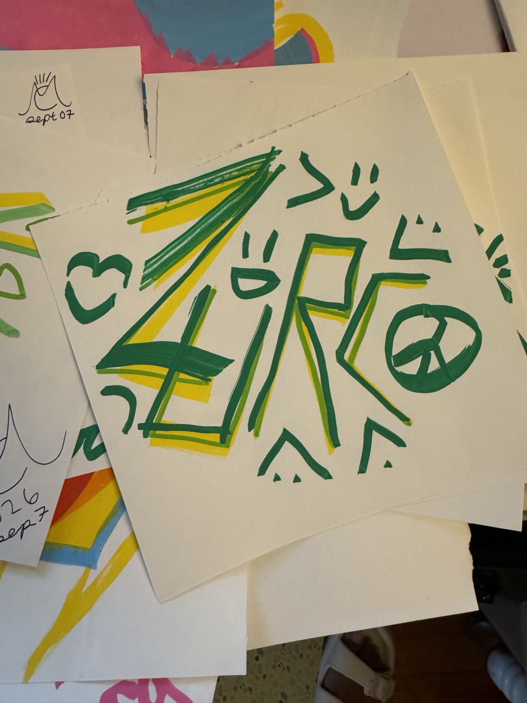 ZURC in green marker with a heart and a peace sign